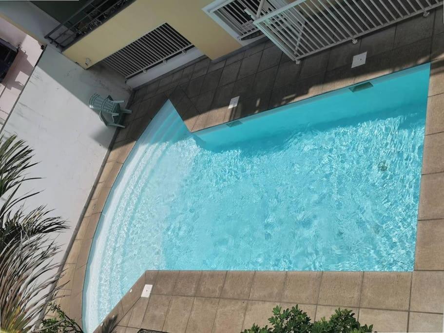 Jade - Appt 2 Chb - 4 Personnes - A 200 M Du Lagon De Saint-Pierre - Residence Avec Belle Piscine Et Parking Prive - Sur Le Front De Mer Et A 2 Pas Du Centre-Ville De St-Pierre Luaran gambar